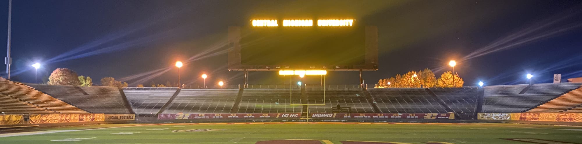 empty football stadium at night under the lights Inland Empire