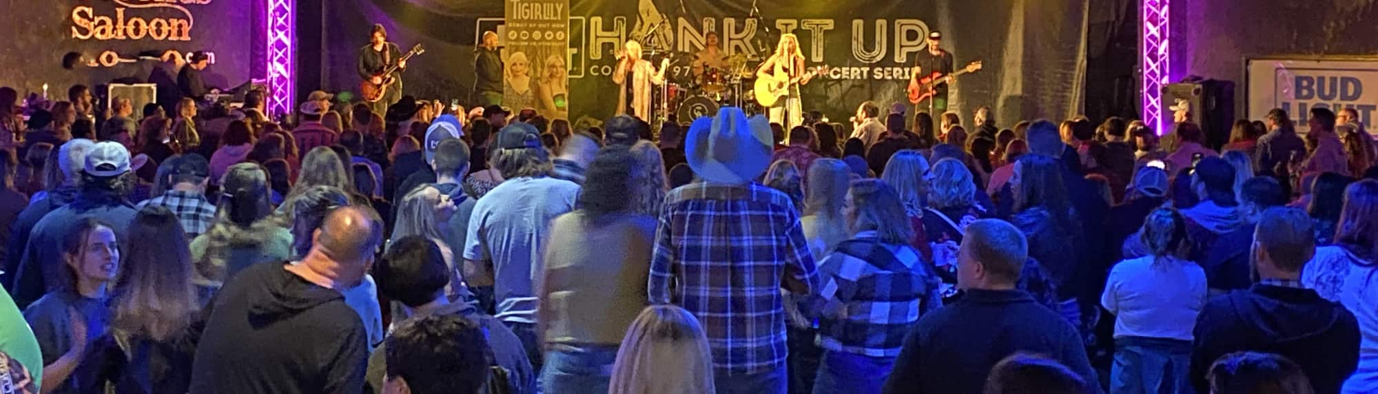 country concert with fans wearing cowboy hats Inland Empire
